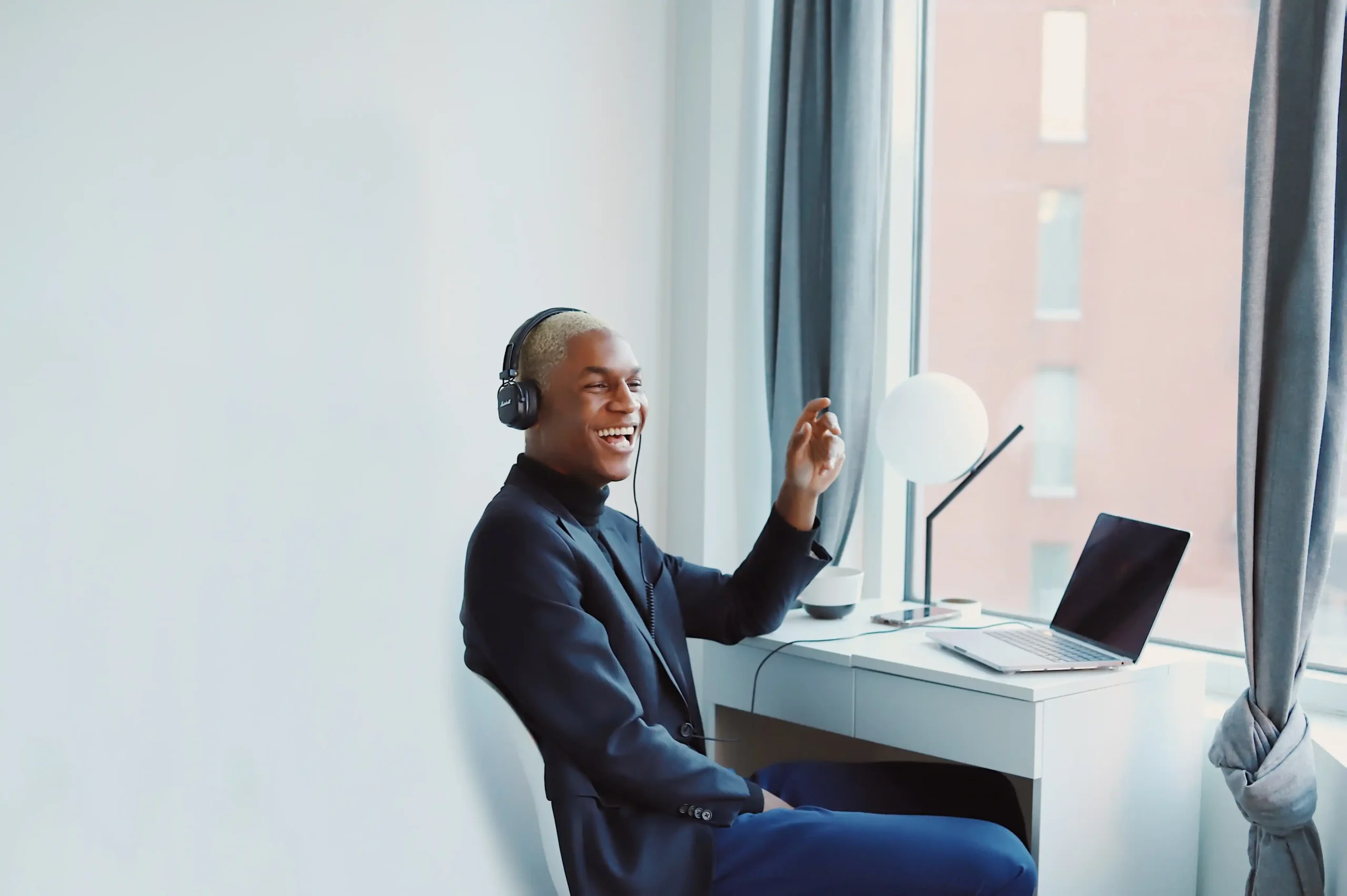 Person talking on the phone at the computer