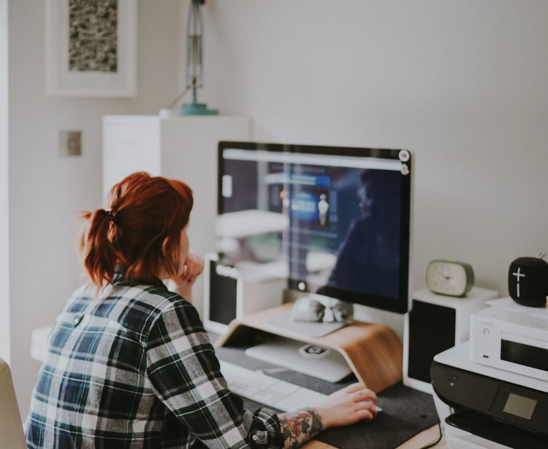 person looking on computer