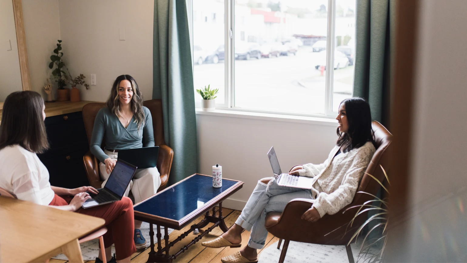 OneSpace Coworking Community Leaders in a Meeting Room