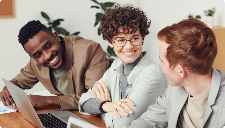 Group of people sitting and working together