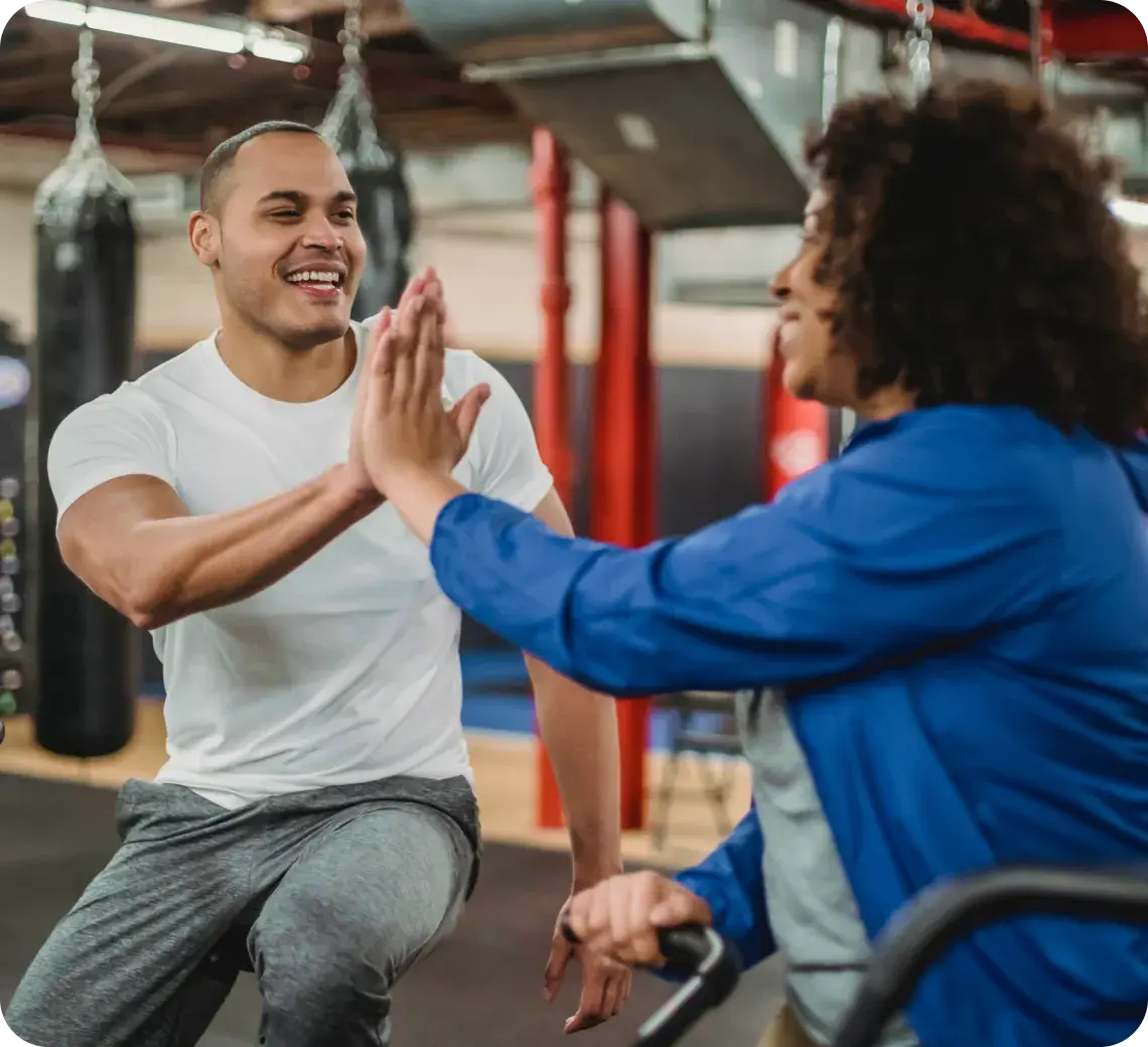 Two people workig out together in a flex micro-gym