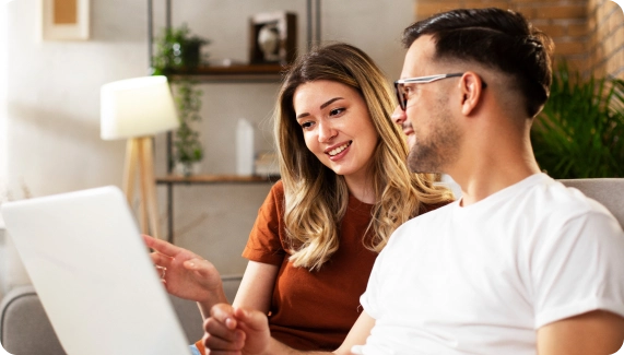Two people studying how to start a coworking space while sitting down