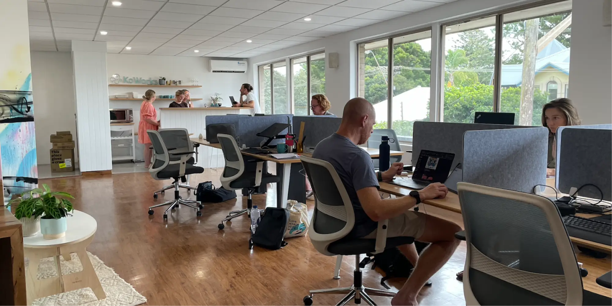 KoWorks community working together in a coworking space