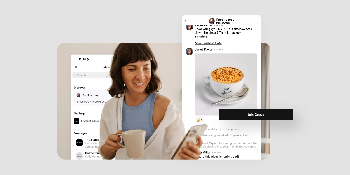 A woman holding a cup of coffee smiles while looking at her phone. Onscreen is a group chat interface with a thread in the “Food reccos” public group, featuring members recommending a café and sharing a photo of a latte.